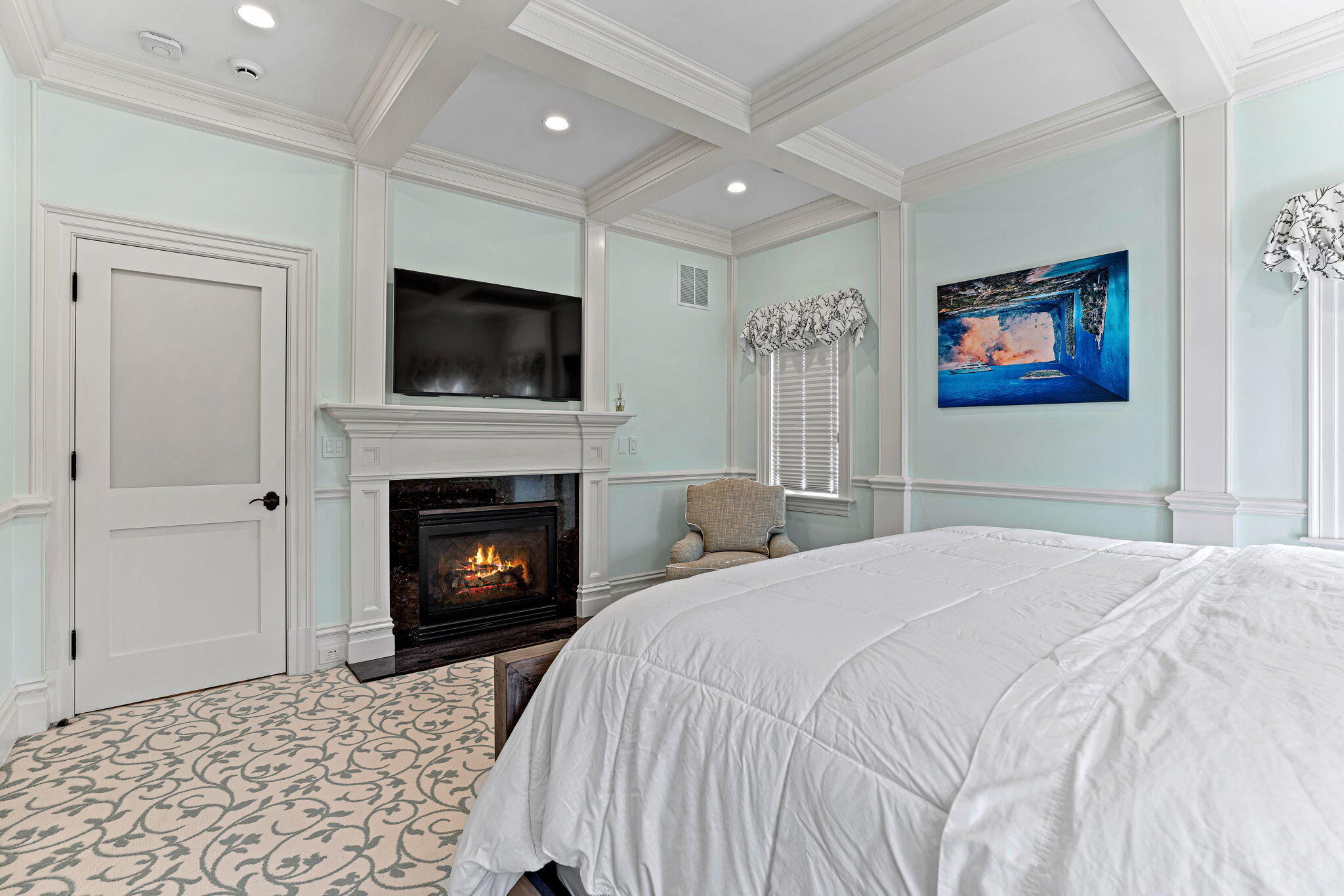 4 Vale Lane Mashpee, MA 02649 - Photo 21 of 33 a bedroom with a bed and a fireplace