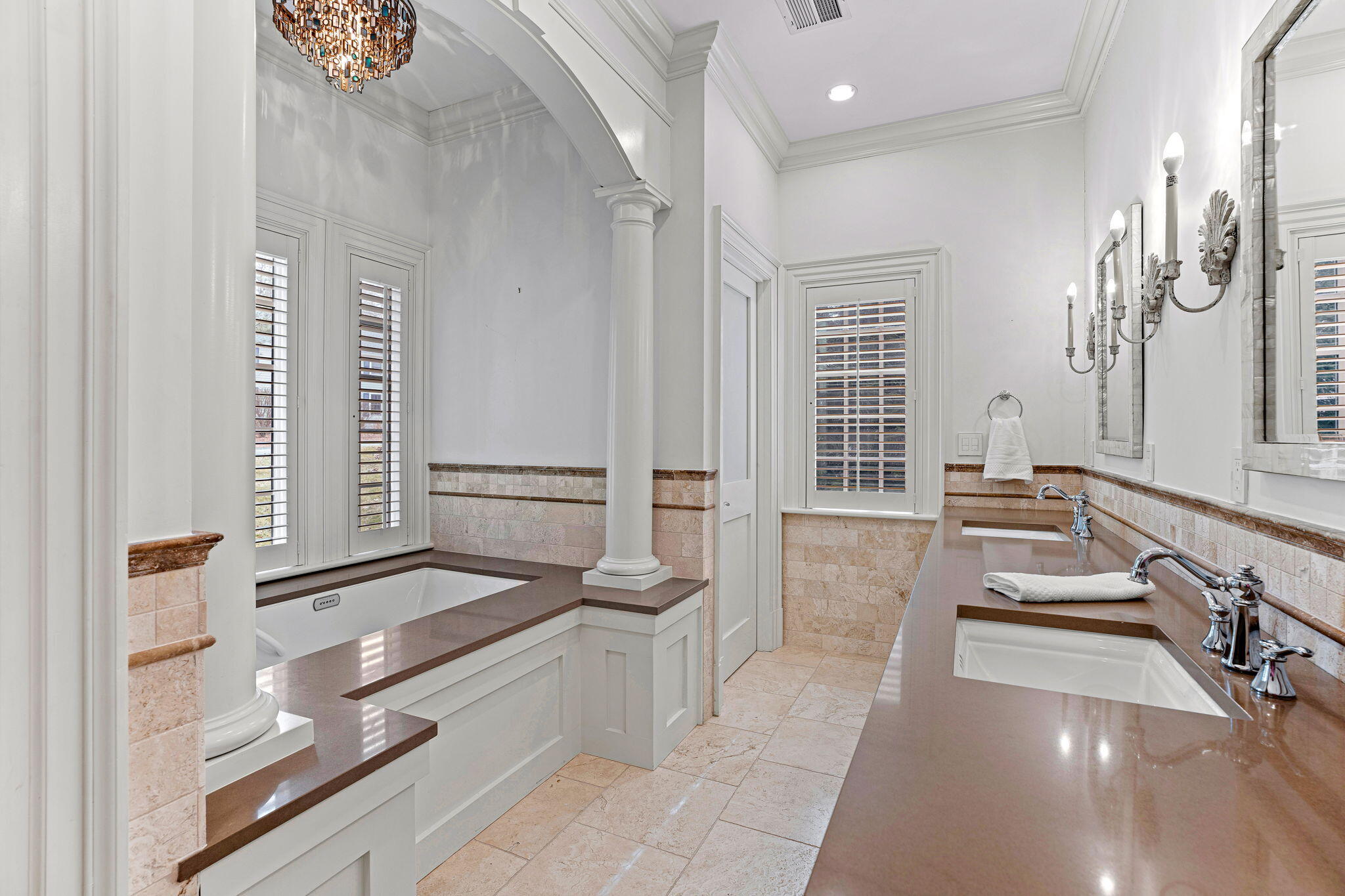 4 Vale Lane Mashpee, MA 02649 - Photo 24 of 33 a bathroom with a tub a double vanity sink and a large mirror