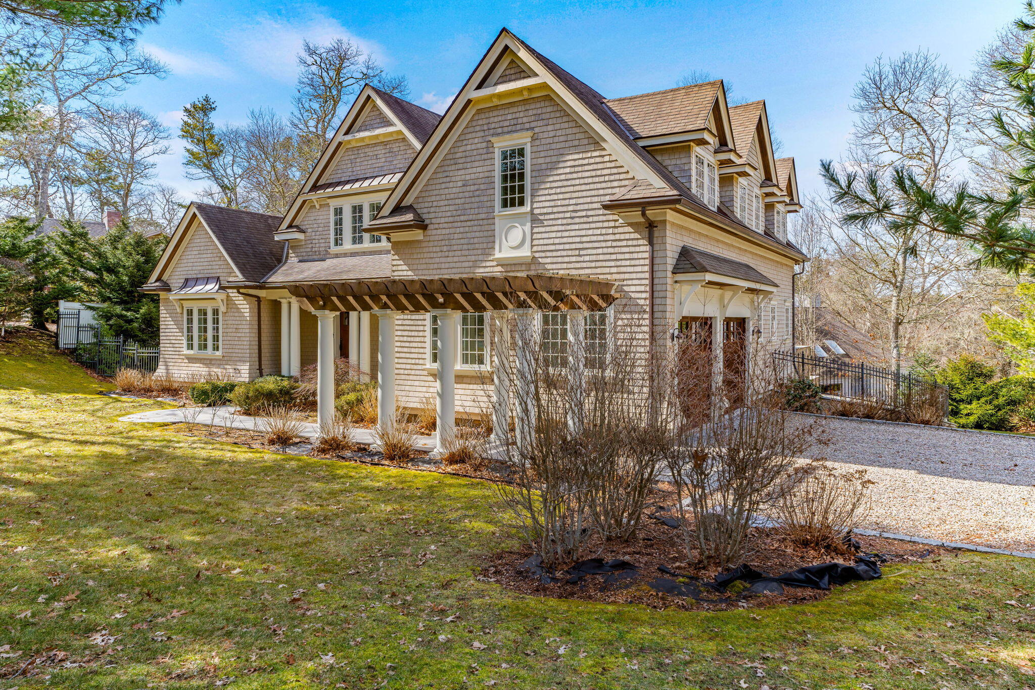 4 Vale Lane Mashpee, MA 02649 - Photo 3 of 33 a front view of a house with a yard