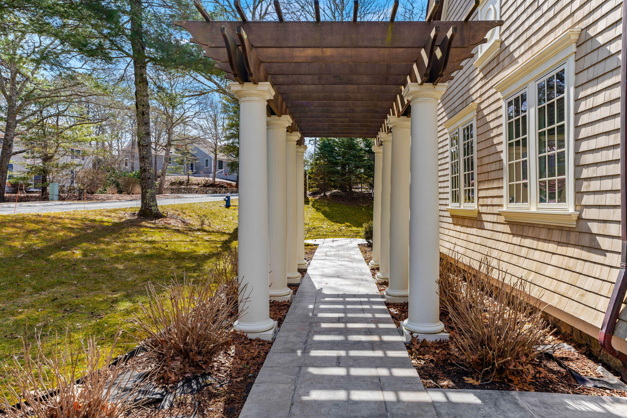 4 Vale Lane Mashpee, MA 02649 - Photo 5 of 33 a view of a swimming pool with a patio