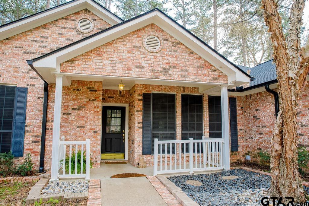 1614 Pineview Lane Hideaway, TX 75771 - Photo 1 of 48 a view of a entrance with a house