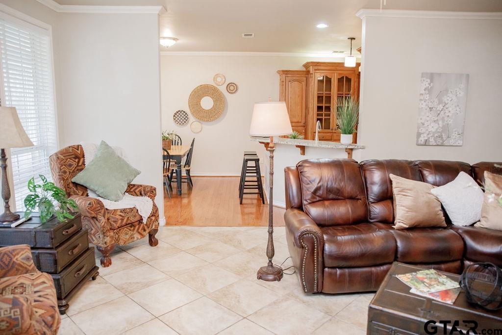 1614 Pineview Lane Hideaway, TX 75771 - Photo 21 of 48 a living room with furniture and wooden floor
