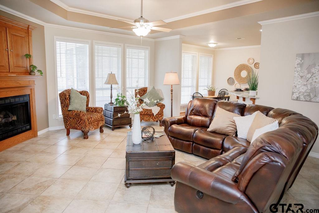 1614 Pineview Lane Hideaway, TX 75771 - Photo 22 of 48 a living room with furniture and a fireplace