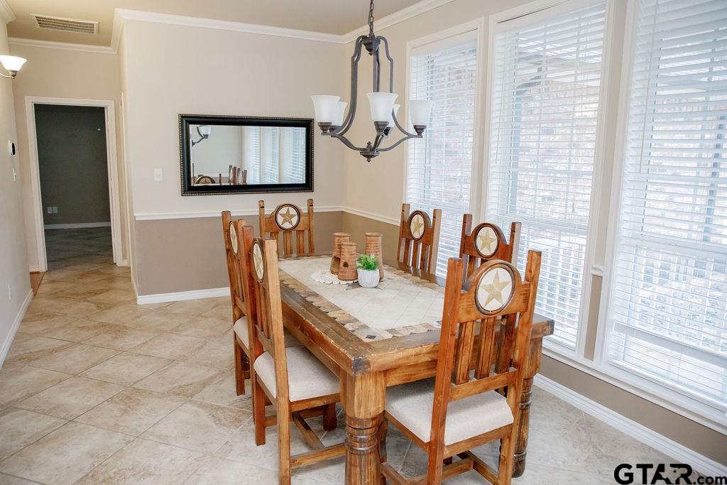 1614 Pineview Lane Hideaway, TX 75771 - Photo 24 of 48 a dining room with furniture and window