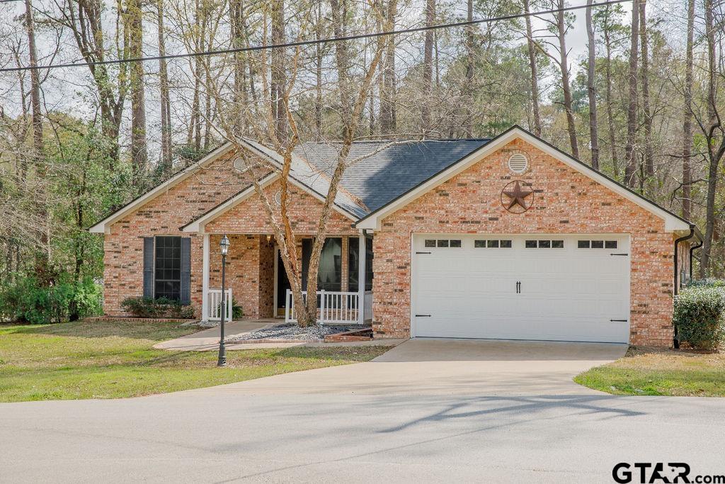 1614 Pineview Lane Hideaway, TX 75771 - Photo 3 of 48 a view of a house with a yard