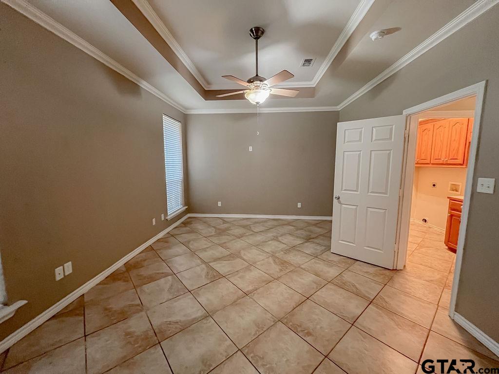 1614 Pineview Lane Hideaway, TX 75771 - Photo 31 of 48 a view of a livingroom with an empty space and a ceiling fan