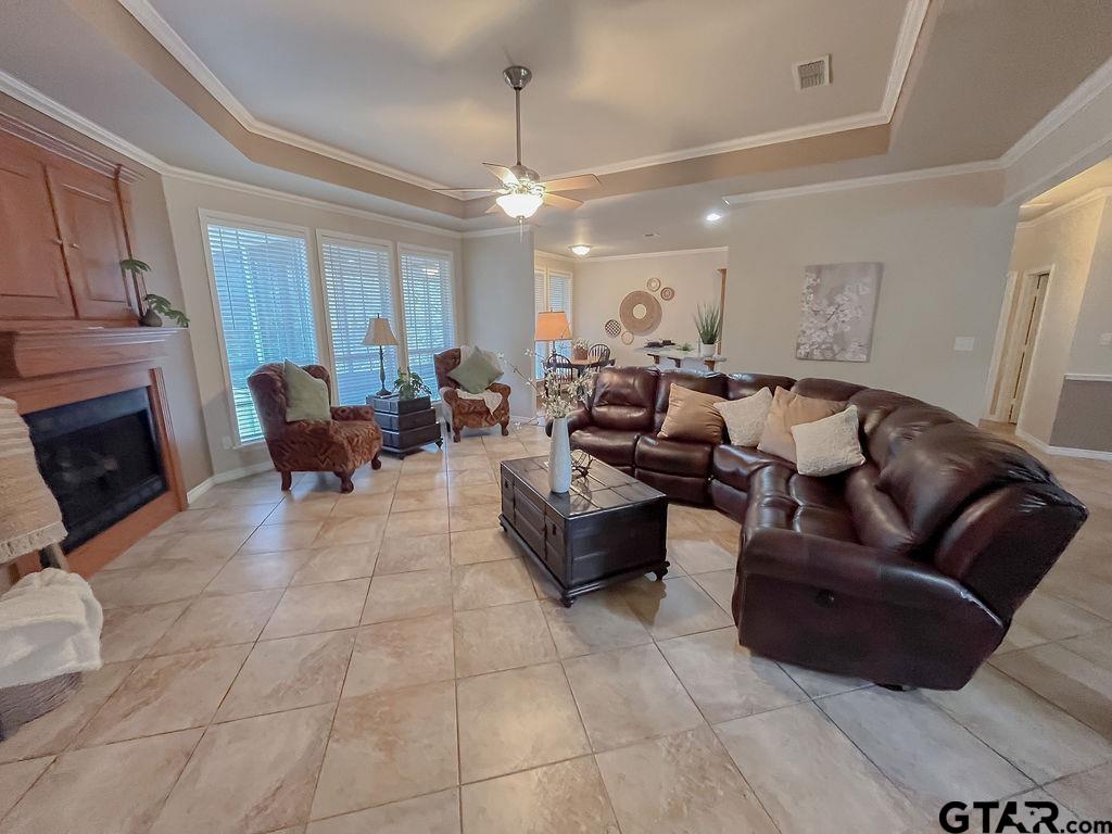 1614 Pineview Lane Hideaway, TX 75771 - Photo 35 of 48 a living room with furniture fireplace and a window