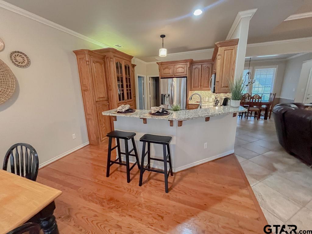 1614 Pineview Lane Hideaway, TX 75771 - Photo 41 of 48 a view of a dining room with furniture