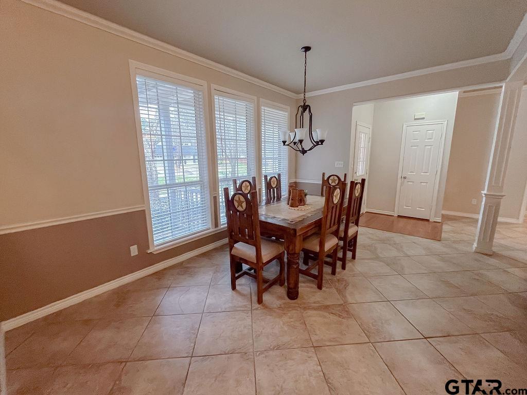 1614 Pineview Lane Hideaway, TX 75771 - Photo 45 of 48 a view of a dining room with furniture and chandelier