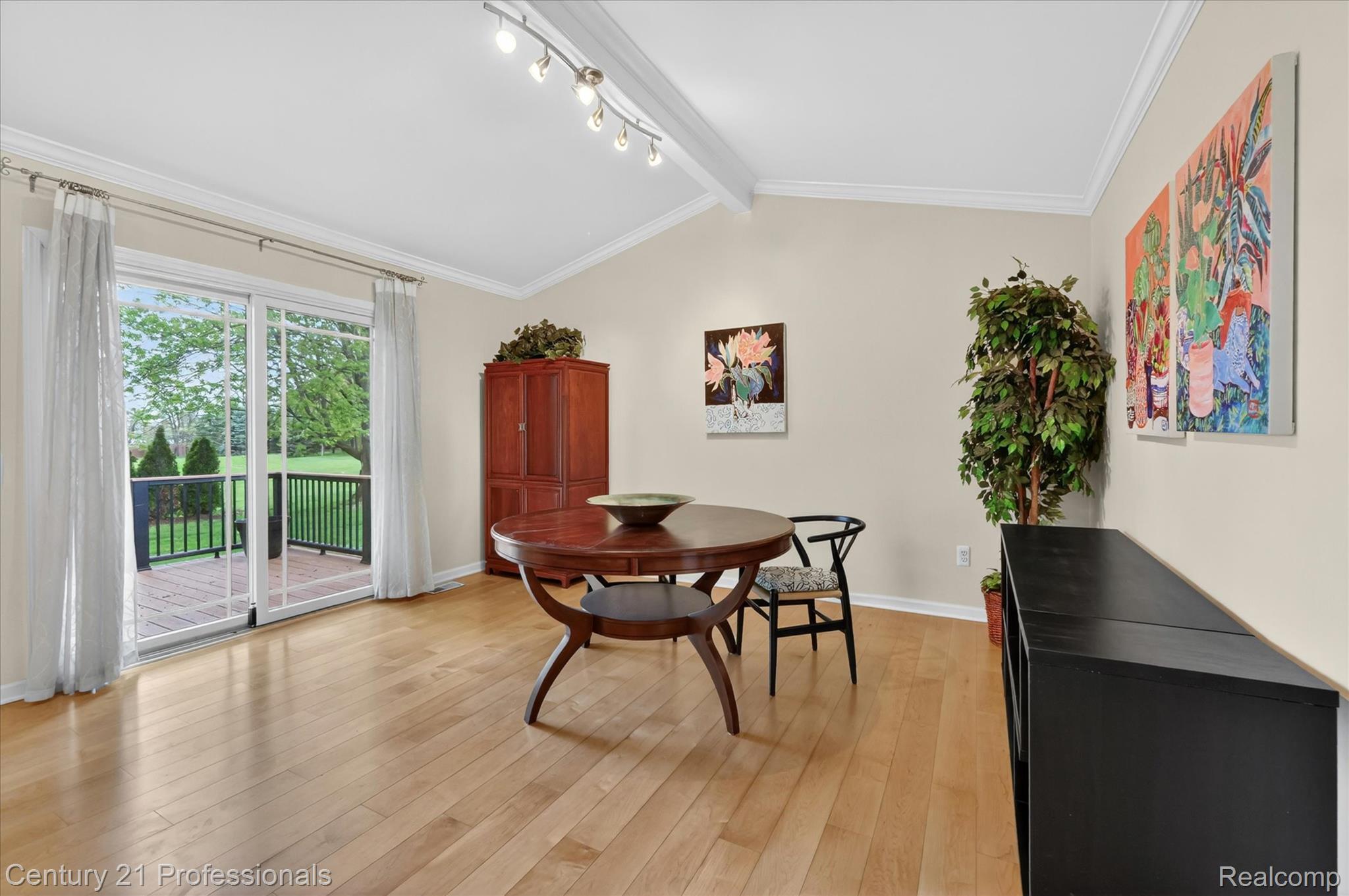 134 Foxboro Drive Rochester, MI 48309 - Photo 8 of 39 Dining room with light wood-style flooring and beam ceiling