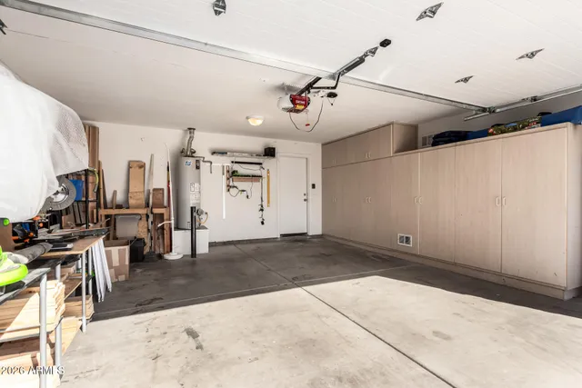 a view of a dinning table and chairs in patio