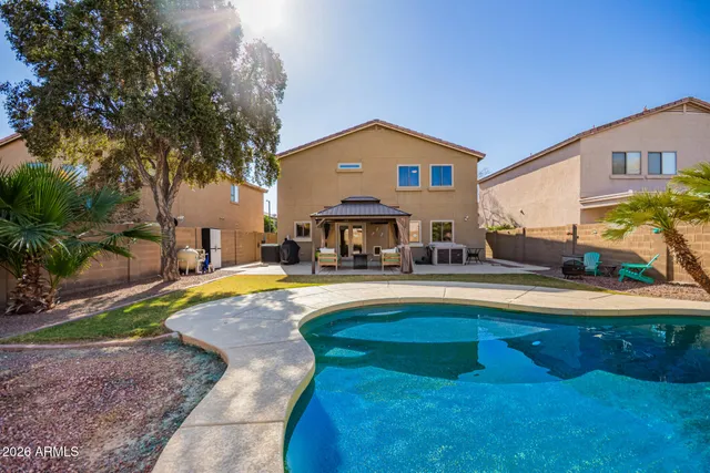 a view of a yard with cars