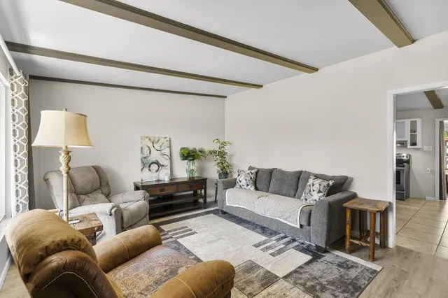 a living room with furniture and a couch