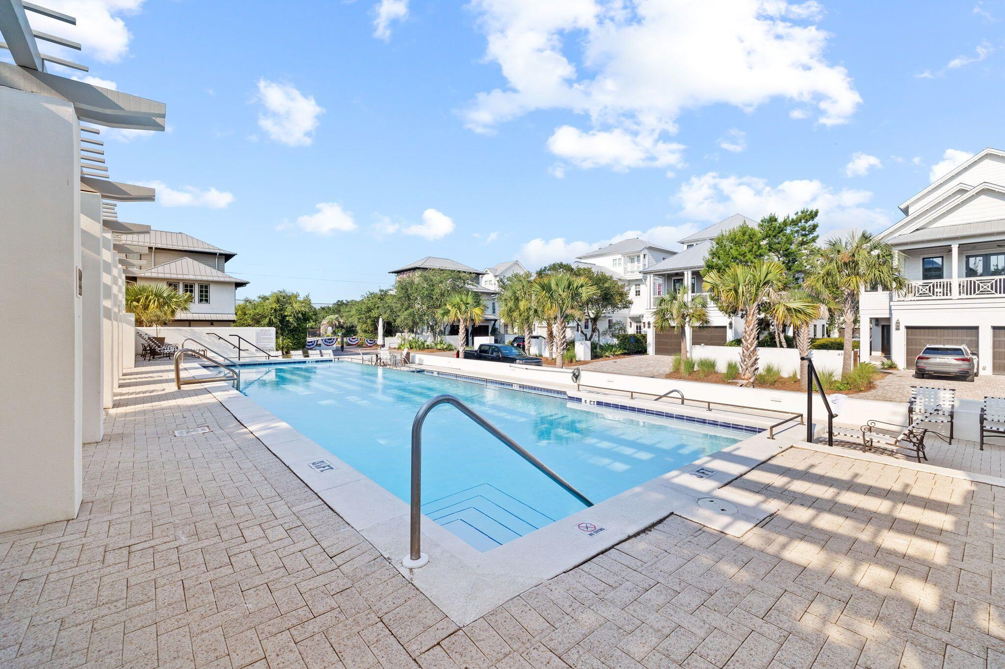 15 Sand Oaks Circle Santa Rosa Beach, FL 32459 - Photo 12 of 18 a swimming pool with outdoor seating and yard