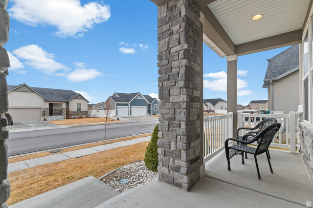 5686 Duke Lane Tooele, UT 84074 - Photo 12 of 38 Porch with a residential view