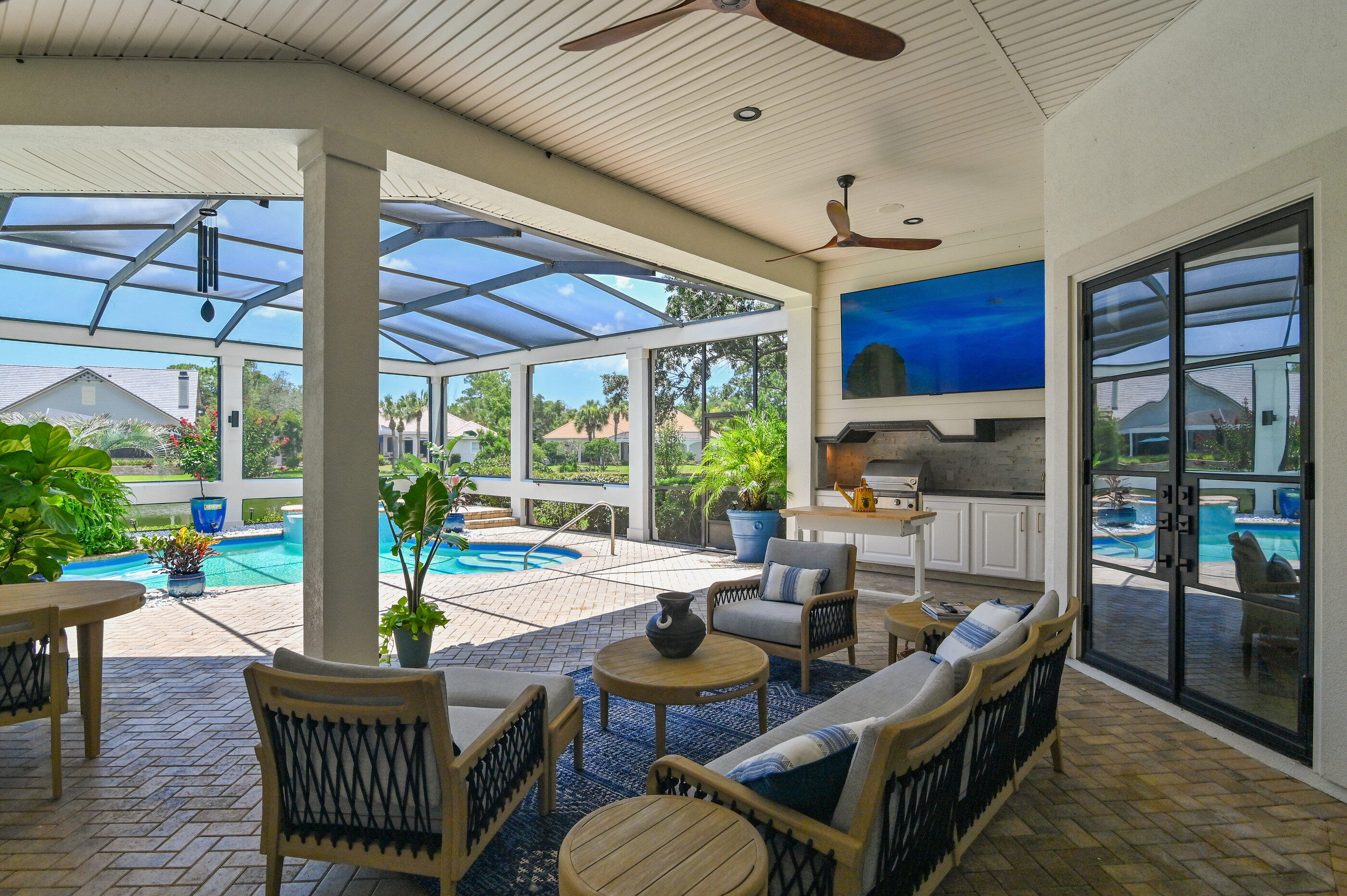 465 Captains Circle Destin, FL 32541 - Photo 30 of 59 a dining room with furniture water view and a fireplace