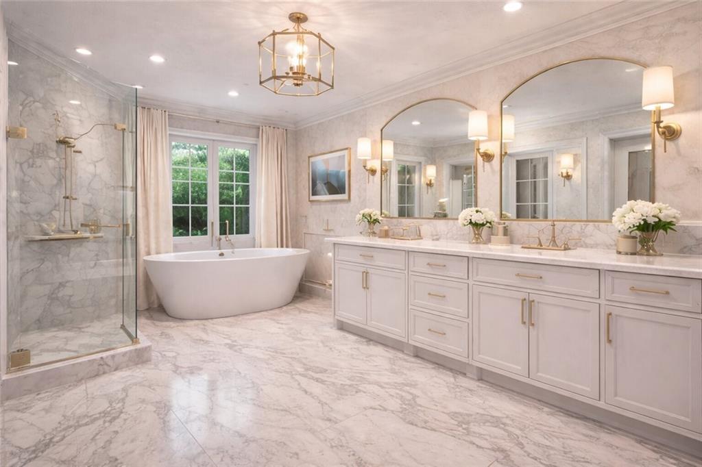 410 East Church Street Monroe, GA 30655 - Photo 17 of 50 a spacious bathroom with a granite countertop sink mirror and bathtub