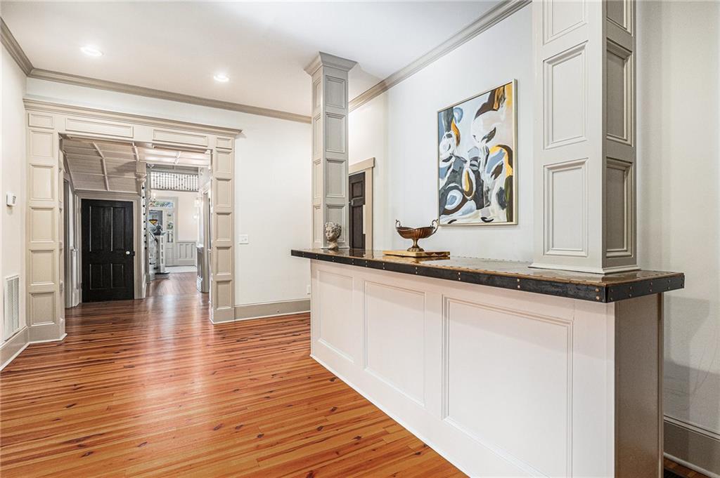 410 East Church Street Monroe, GA 30655 - Photo 18 of 50 a hallway with wooden floor