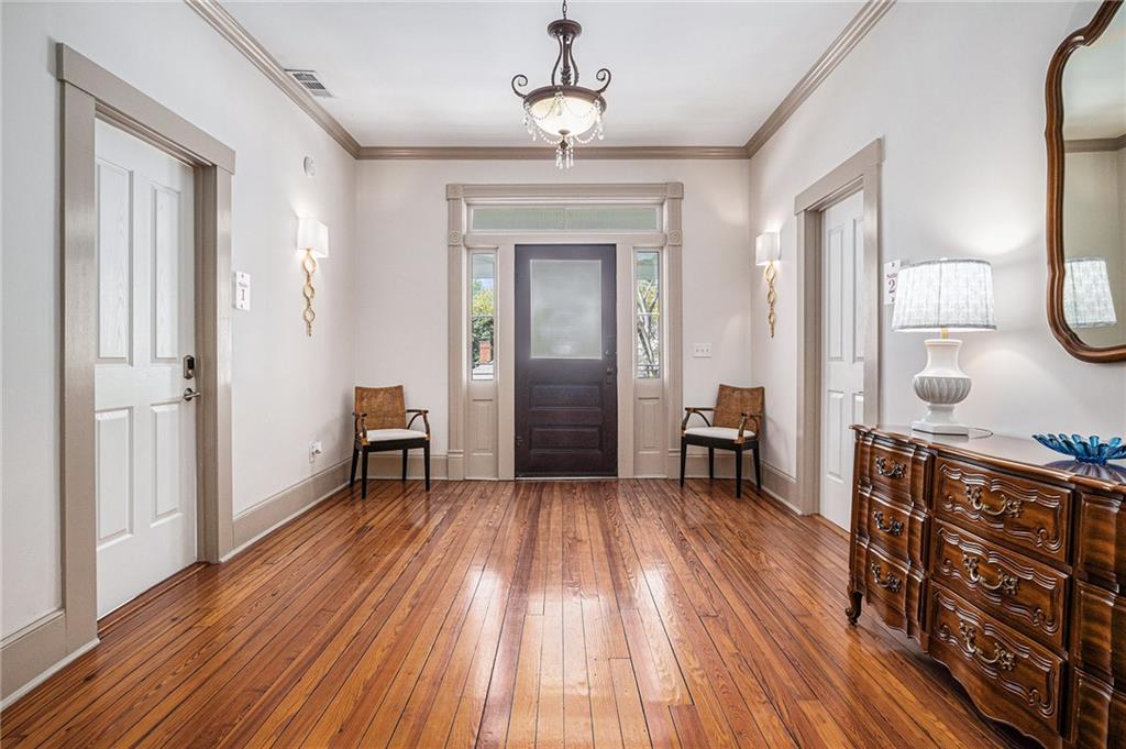 410 East Church Street Monroe, GA 30655 - Photo 19 of 50 a view of a room with wooden floor and staircase