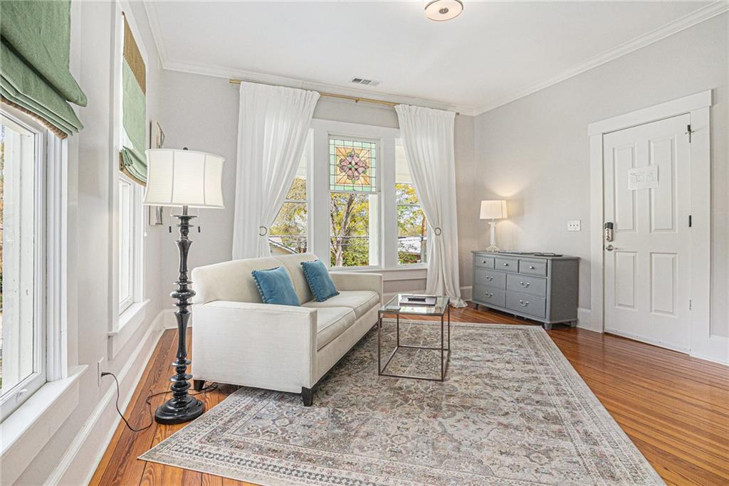 410 East Church Street Monroe, GA 30655 - Photo 20 of 50 a living room with furniture and a large window