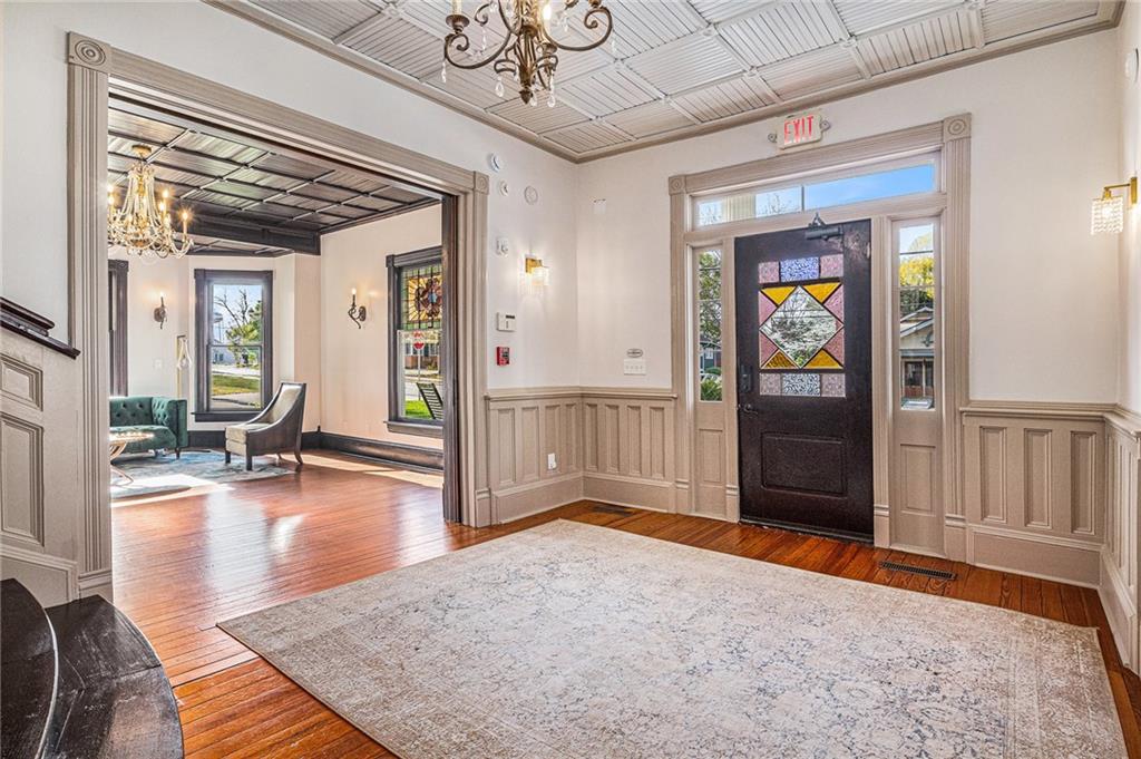 410 East Church Street Monroe, GA 30655 - Photo 3 of 50 a view of livingroom with furniture and wooden floor