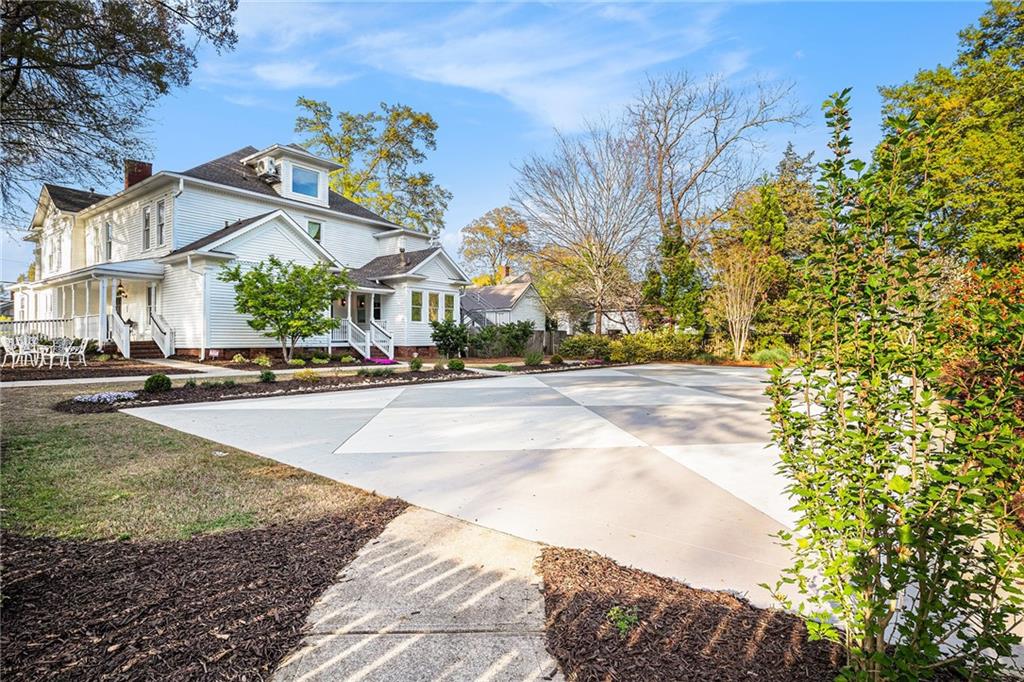410 East Church Street Monroe, GA 30655 - Photo 45 of 50 a view of a street with houses