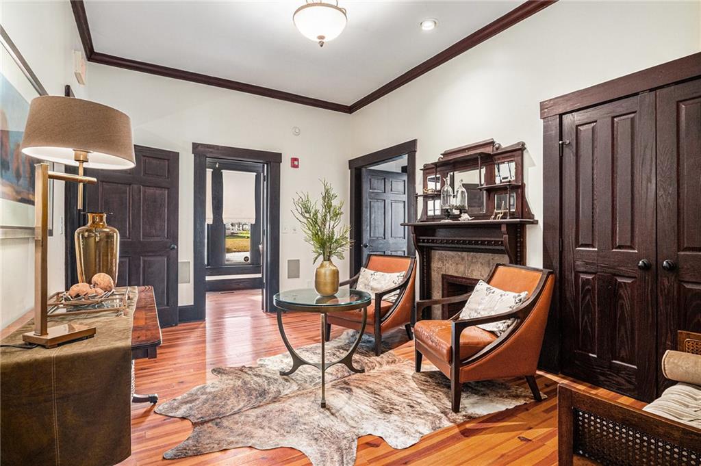 410 East Church Street Monroe, GA 30655 - Photo 9 of 50 a outdoor living space with furniture a rug and a window