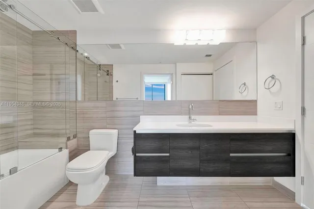 a view of a city with a building in the background