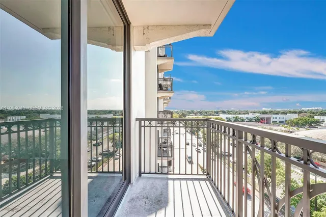a view of storage and utility room with washer and dryer