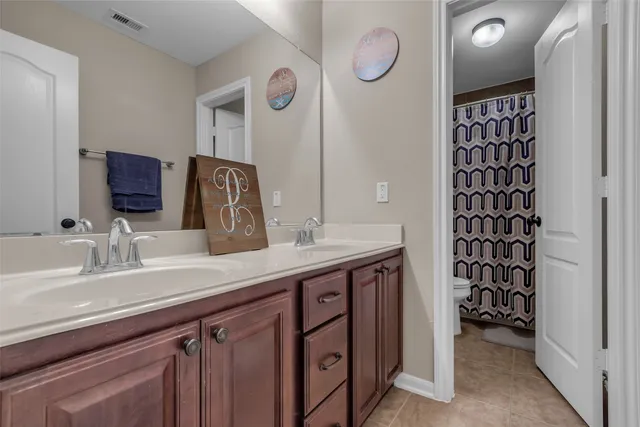 a room with furniture and a flat screen tv
