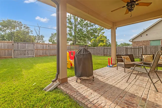 a view of a park with large trees