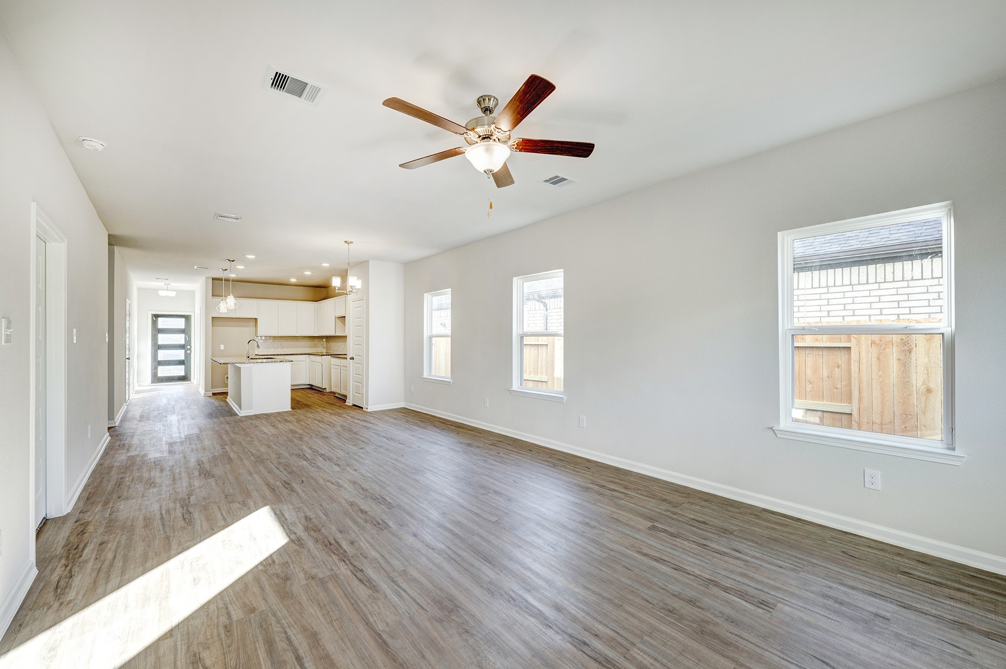 33010 School Hl Road Fulshear, TX 77441 - Photo 7 of 23 Piedmont- Family Room. Sample image for illustration; upgrades, options, and colors may vary.