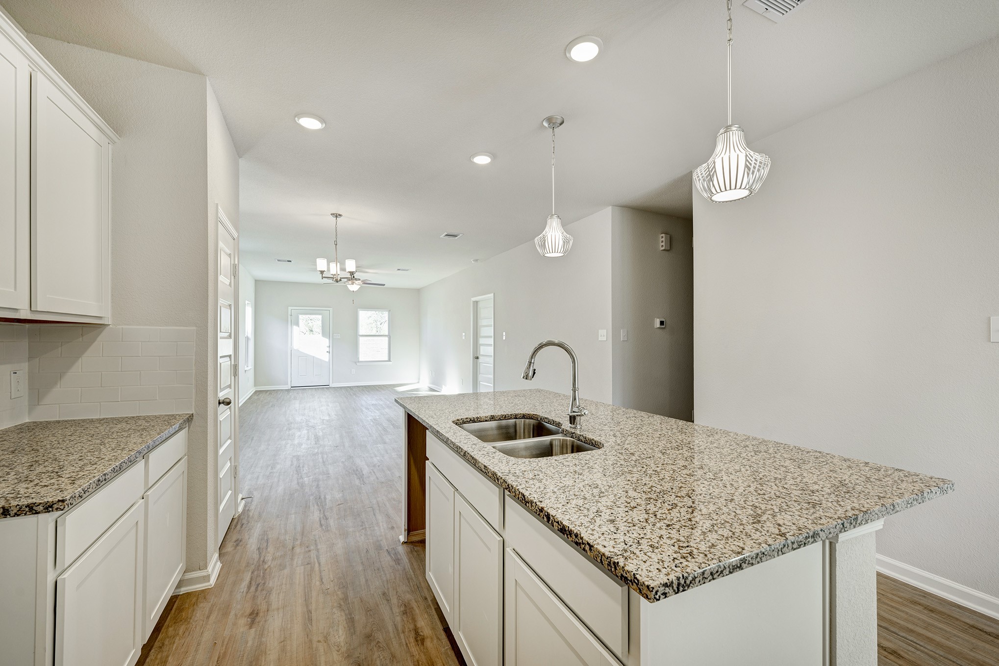 33010 School Hl Road Fulshear, TX 77441 - Photo 9 of 23 Piedmont- Kitchen. Sample image for illustration; upgrades, options, and colors may vary.