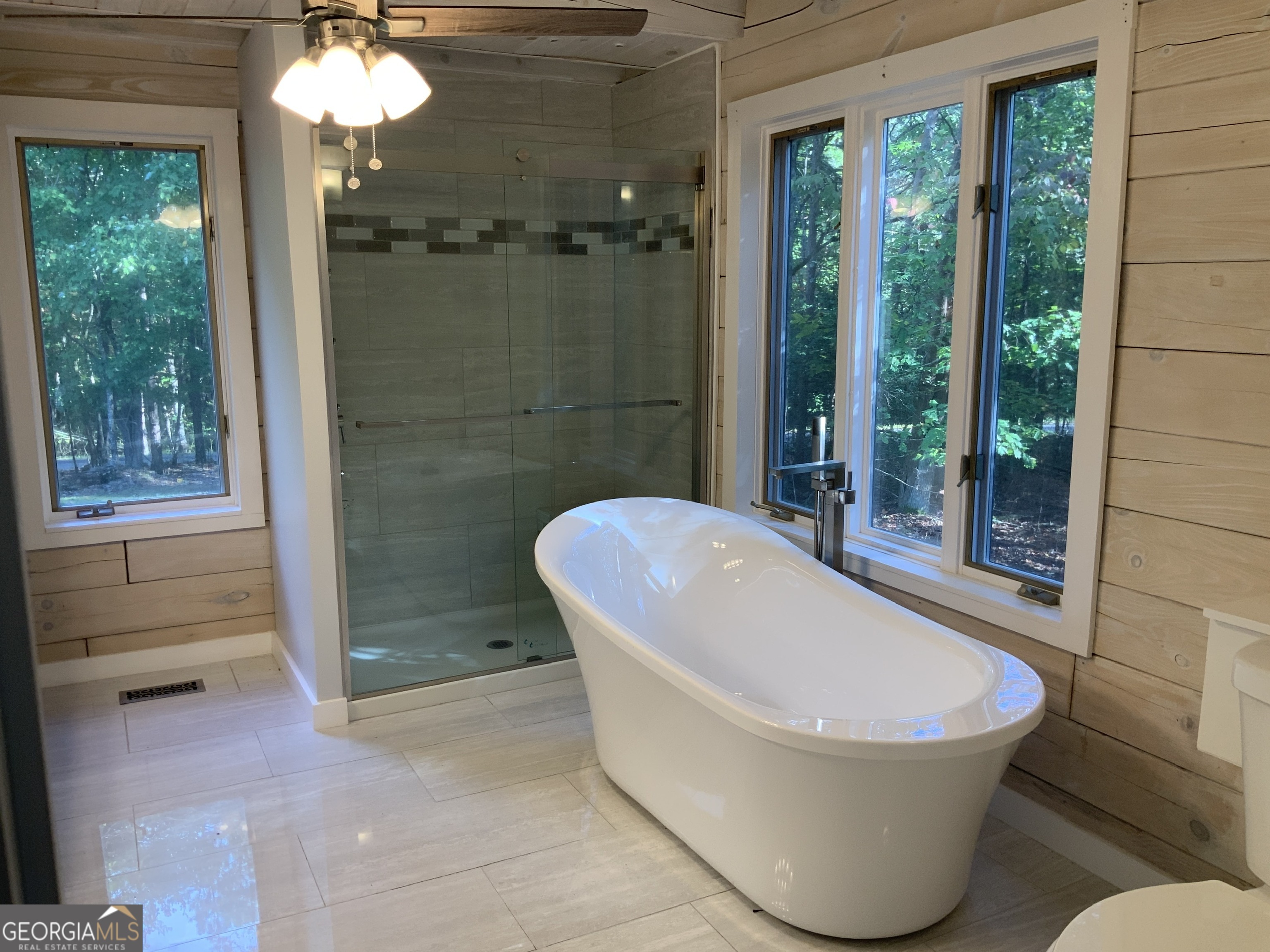 11 Foxfire Road Blairsville, GA 30512 - Photo 31 of 60 a bathroom with a bathtub and shower