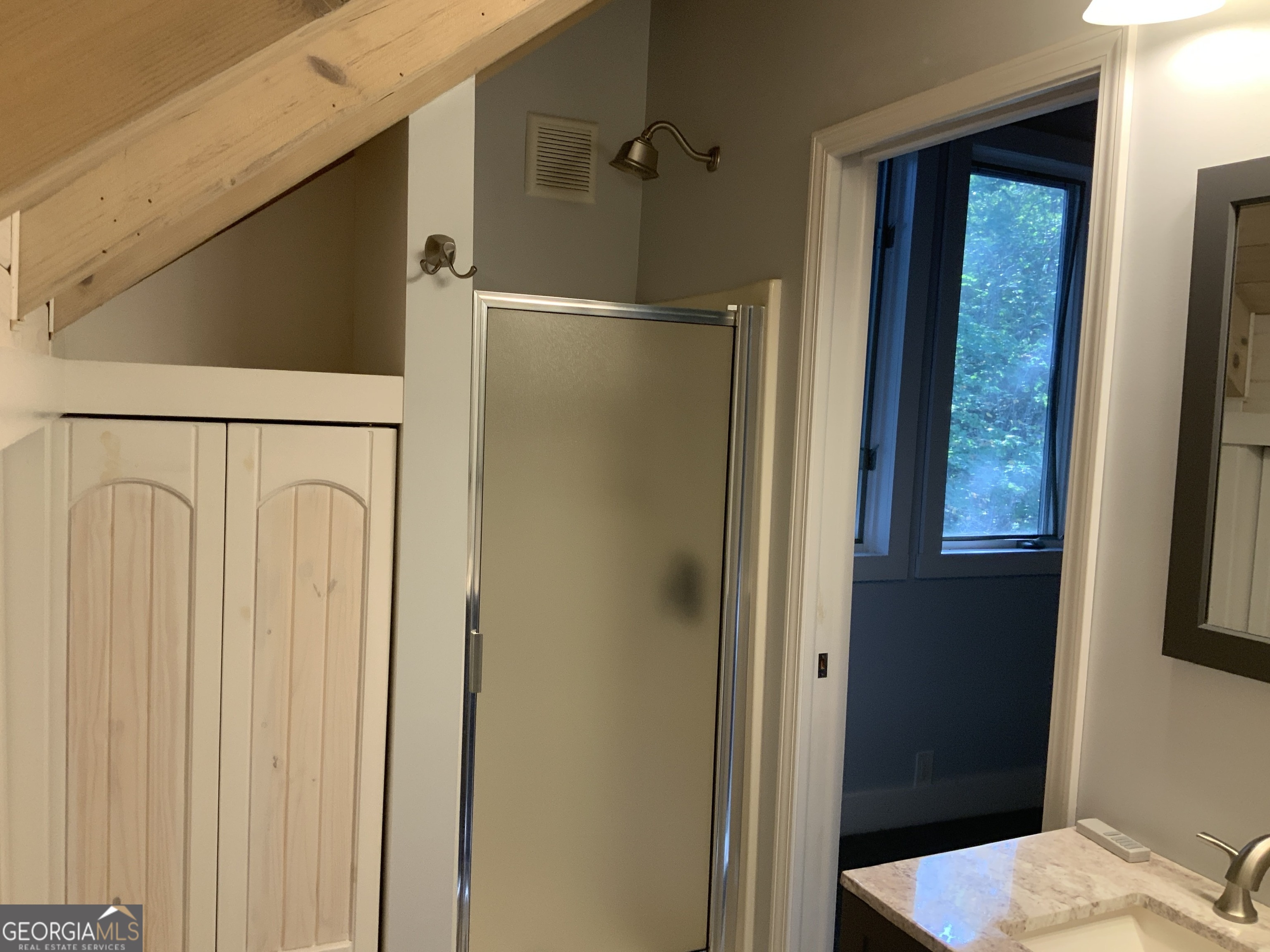 11 Foxfire Road Blairsville, GA 30512 - Photo 33 of 60 a bathroom with a sink and a mirror