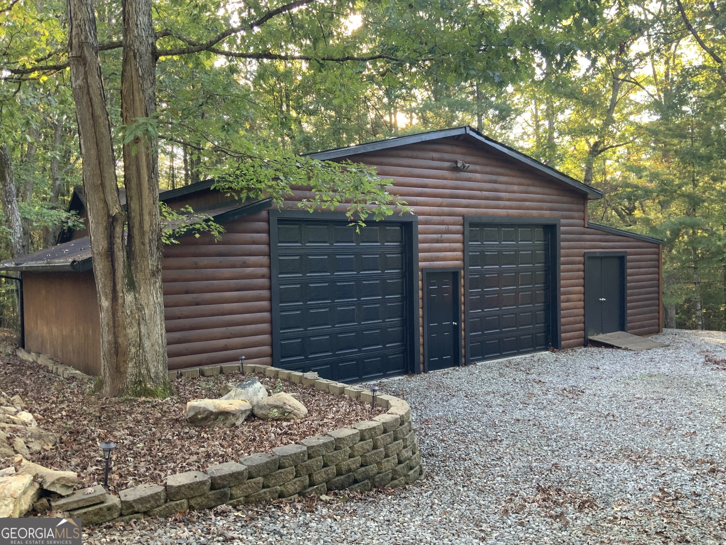 11 Foxfire Road Blairsville, GA 30512 - Photo 4 of 60 a view of a small house with a small yard