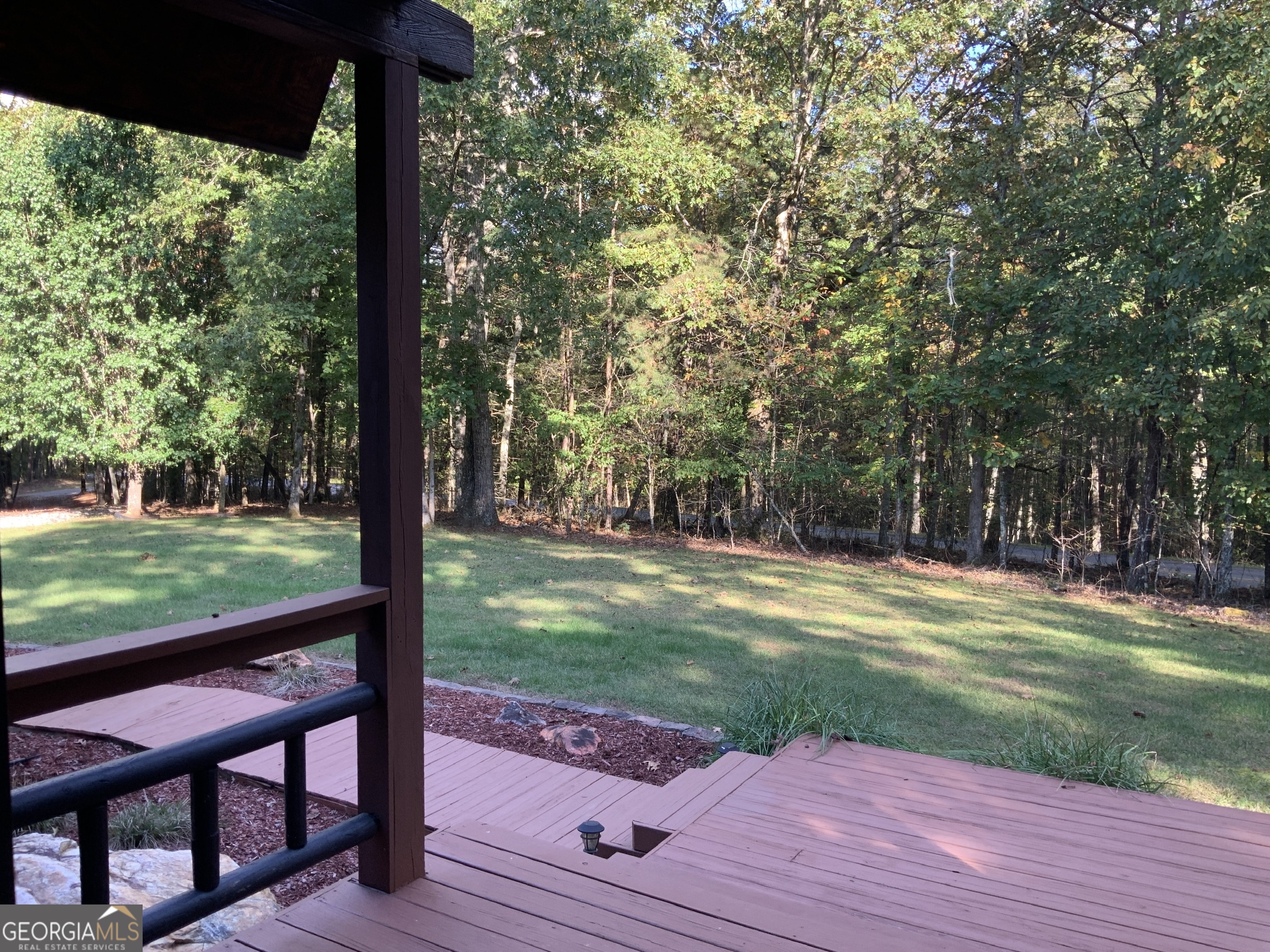 11 Foxfire Road Blairsville, GA 30512 - Photo 46 of 60 a view of a wooden deck with a yard