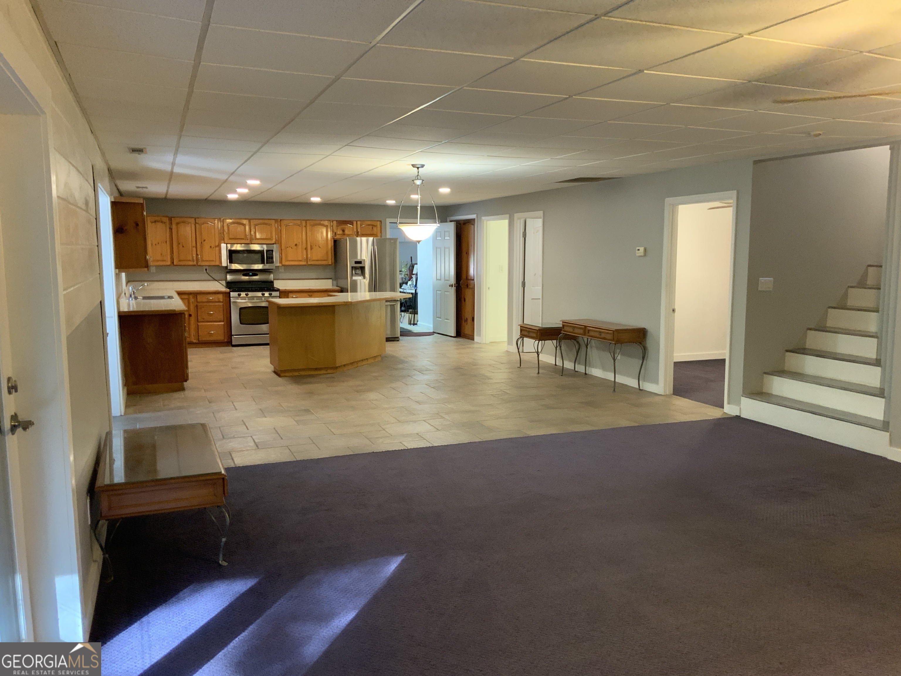 11 Foxfire Road Blairsville, GA 30512 - Photo 51 of 60 a kitchen with lots of counter top space and living room