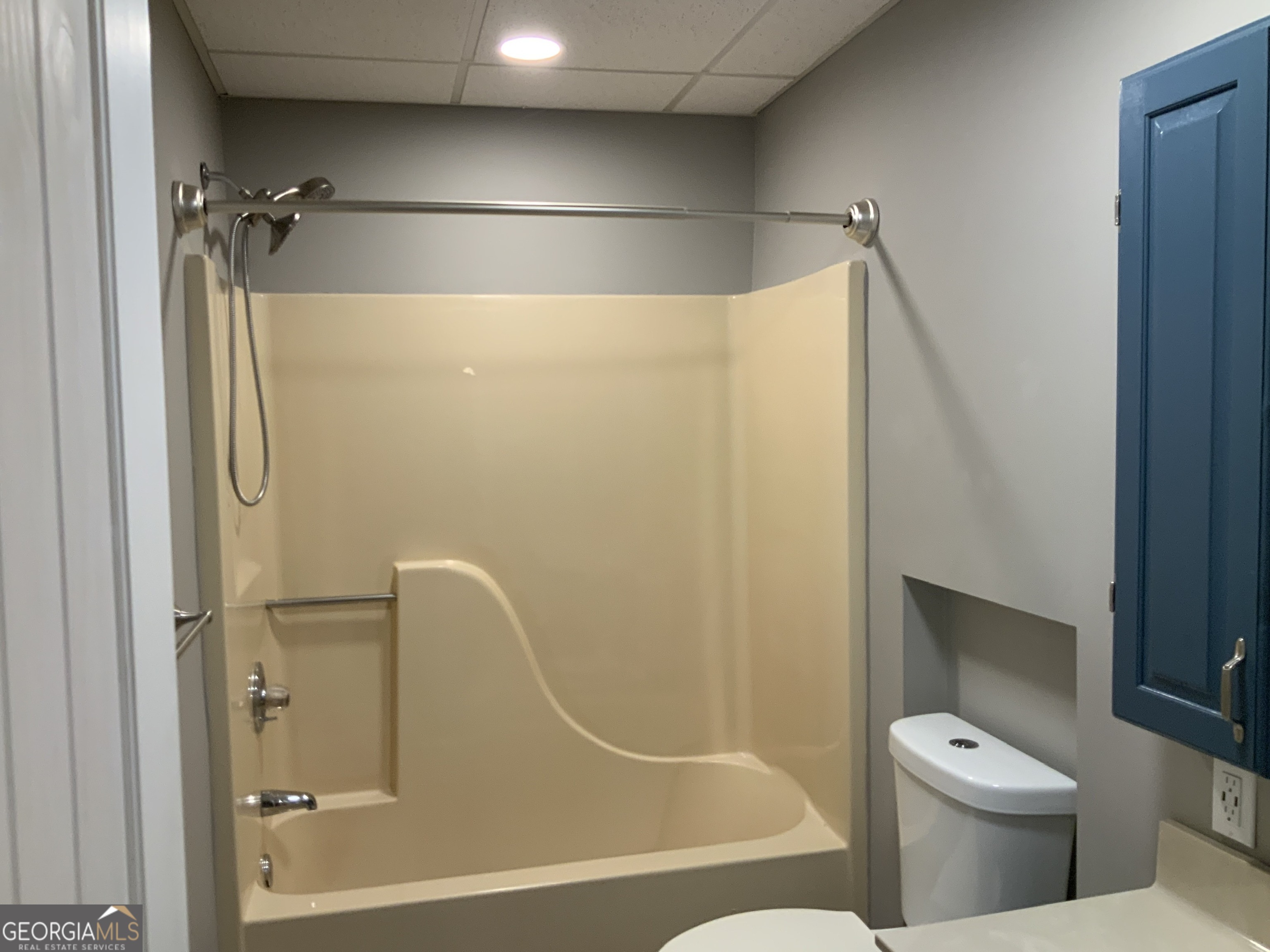 11 Foxfire Road Blairsville, GA 30512 - Photo 54 of 60 a bathroom with a granite countertop bathtub shower