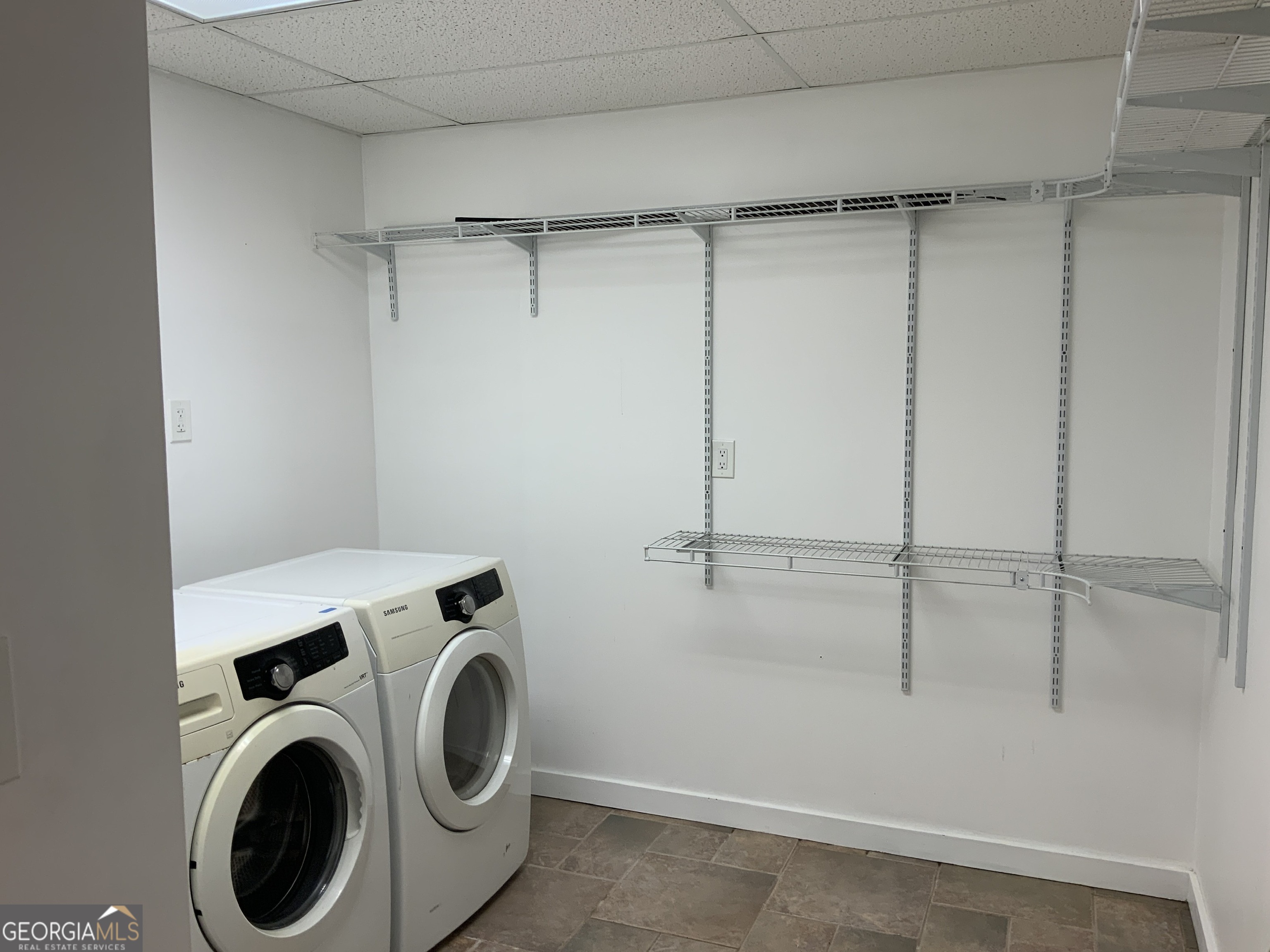 11 Foxfire Road Blairsville, GA 30512 - Photo 55 of 60 a view of storage and utility room with racks on the wall