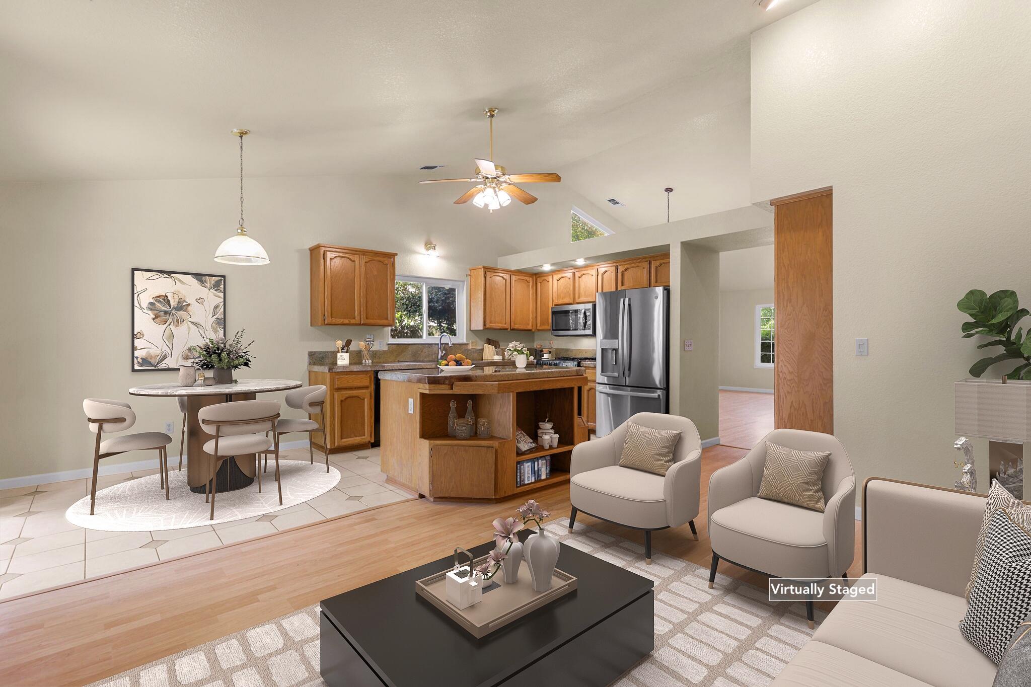 550 Vansicklen Way Redding, CA 96003 - Photo 14 of 52 a living room with furniture kitchen view and a chandelier