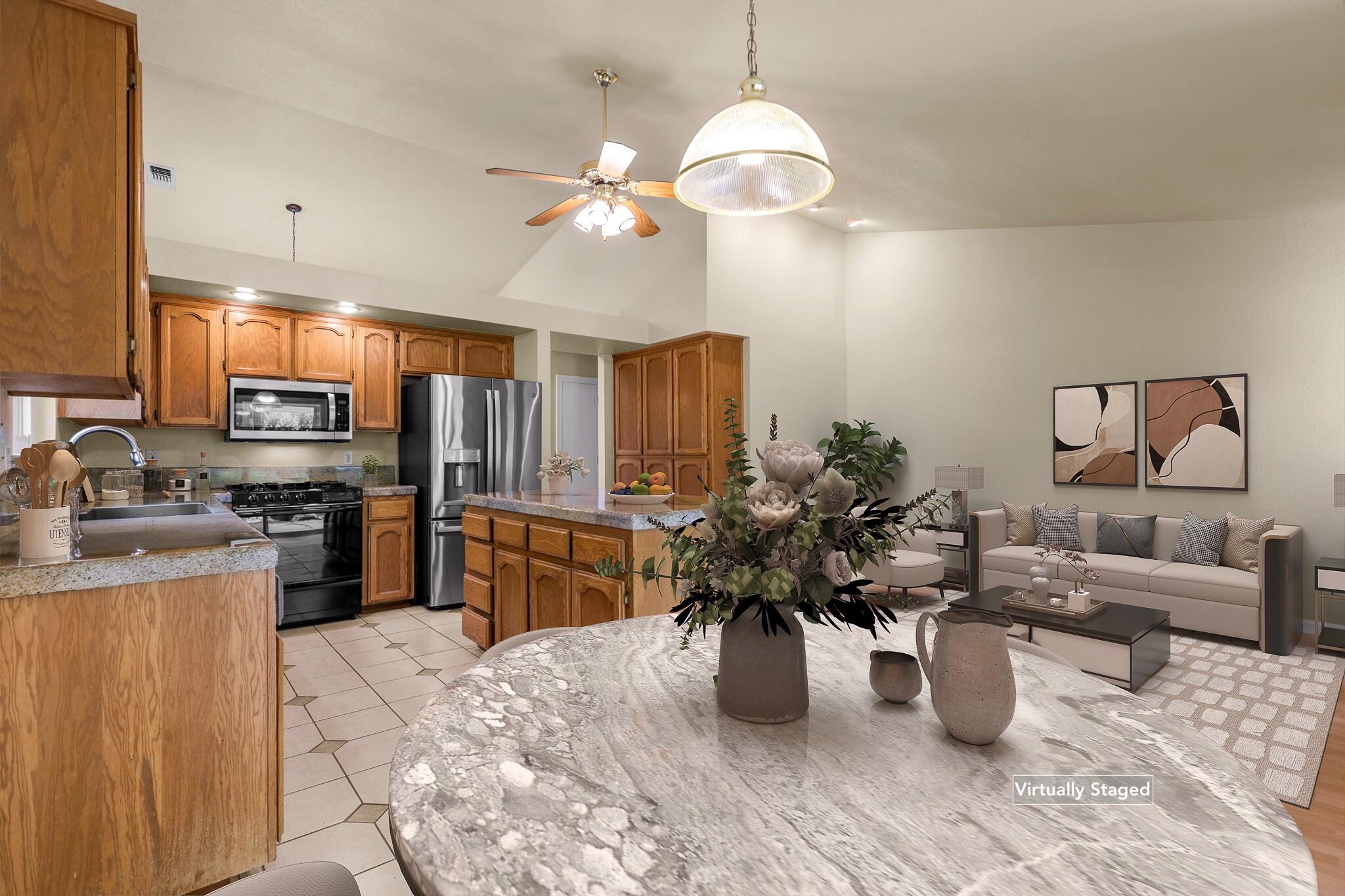 550 Vansicklen Way Redding, CA 96003 - Photo 16 of 52 a kitchen with stainless steel appliances kitchen island granite countertop a refrigerator a stove and a sink dishwasher