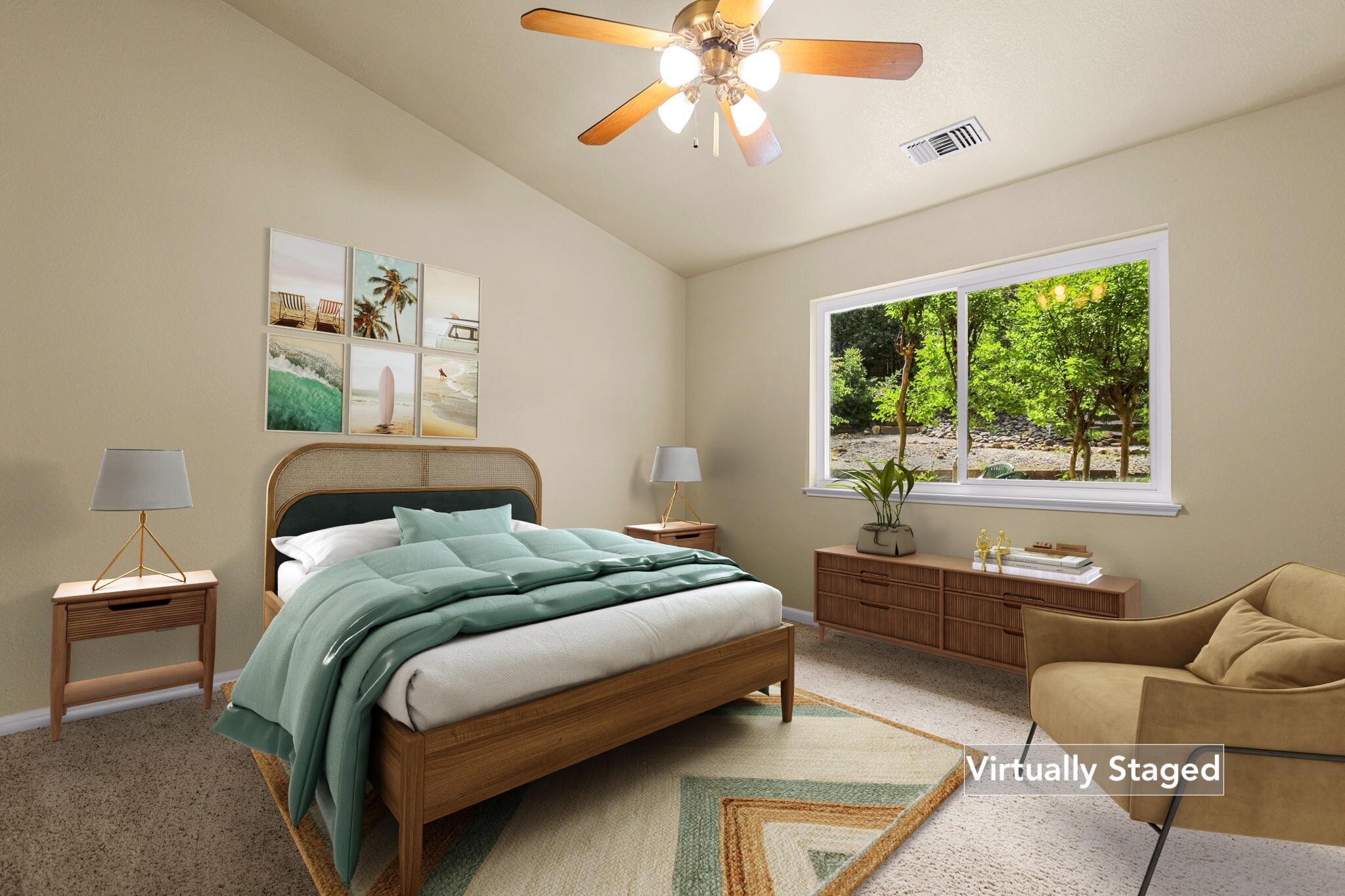 550 Vansicklen Way Redding, CA 96003 - Photo 23 of 52 a bedroom with a bed and a chandelier