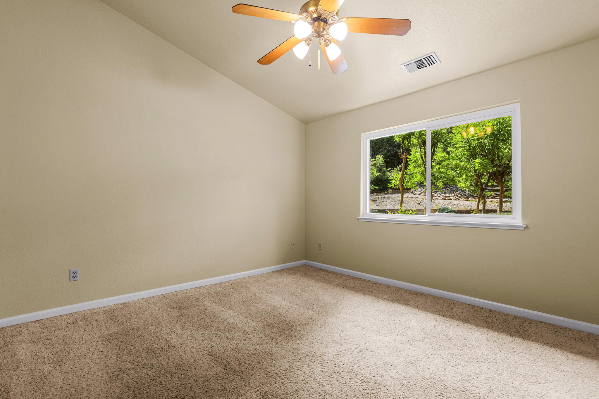 550 Vansicklen Way Redding, CA 96003 - Photo 24 of 52 a view of an empty room with a window