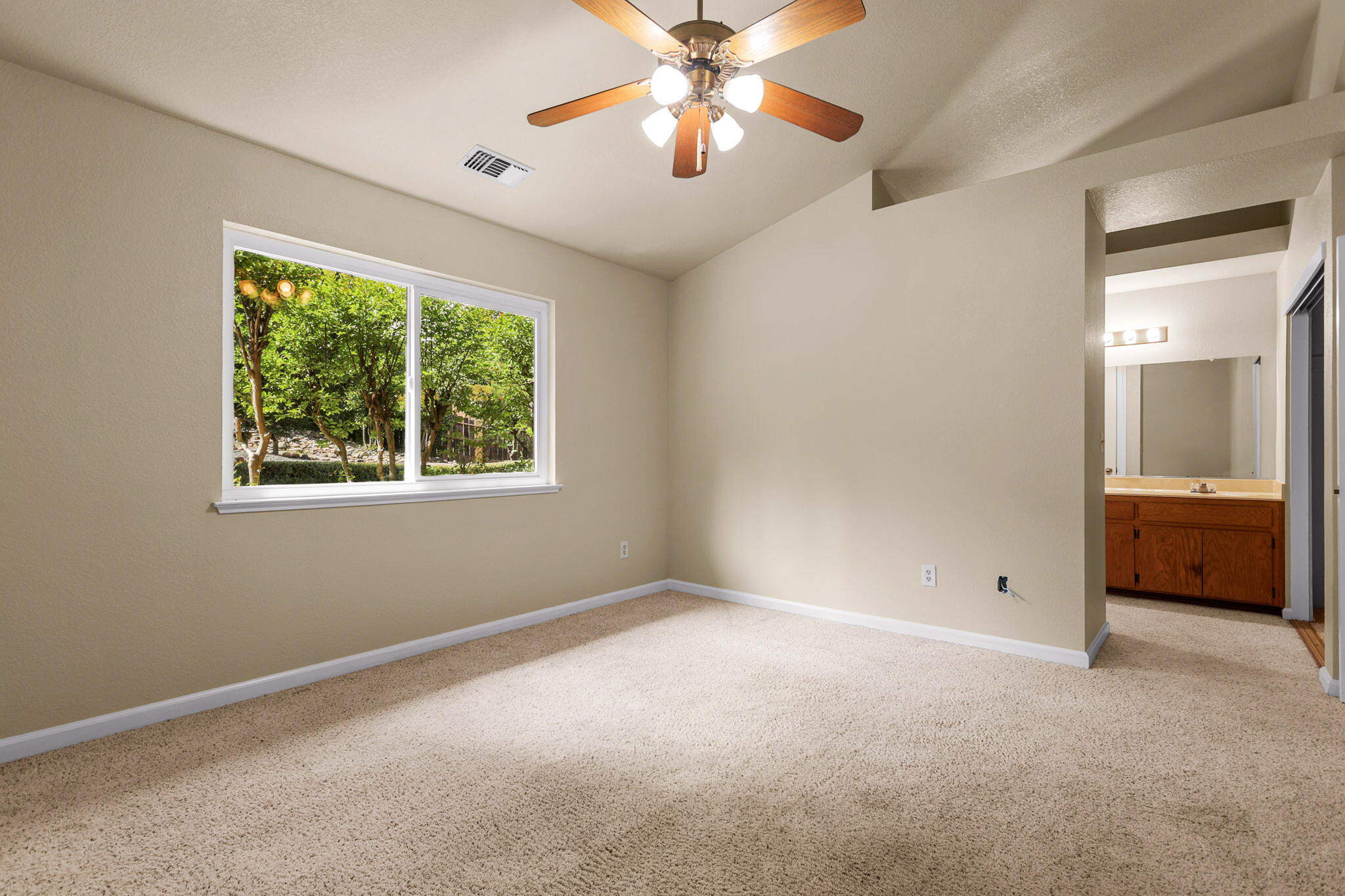 550 Vansicklen Way Redding, CA 96003 - Photo 26 of 52 a view of an empty room with a window