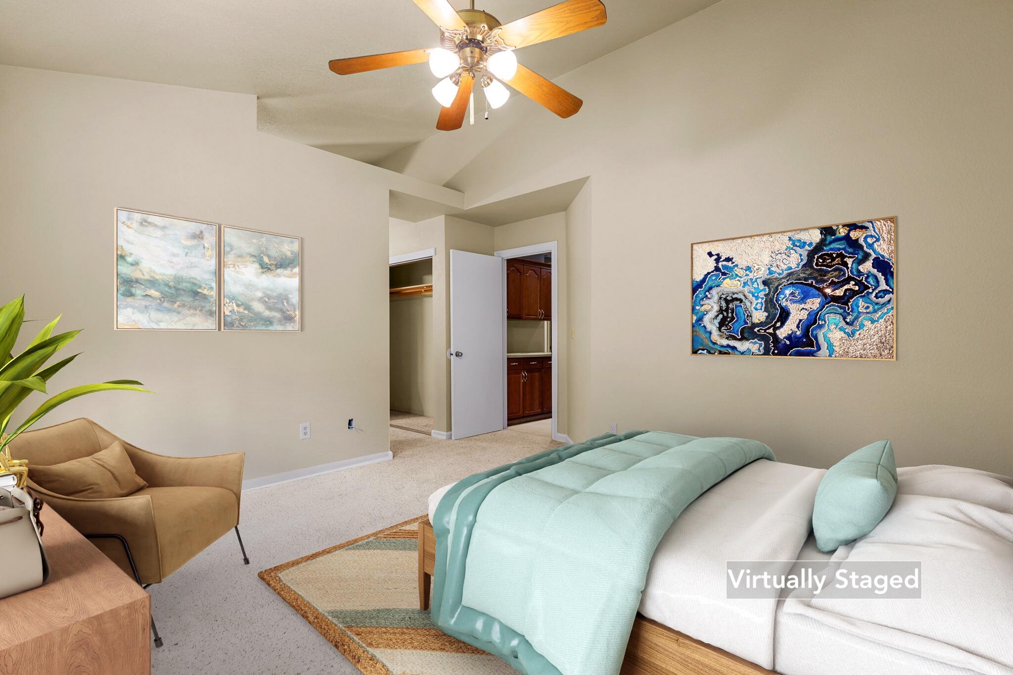 550 Vansicklen Way Redding, CA 96003 - Photo 27 of 52 a bedroom with a bed and couch