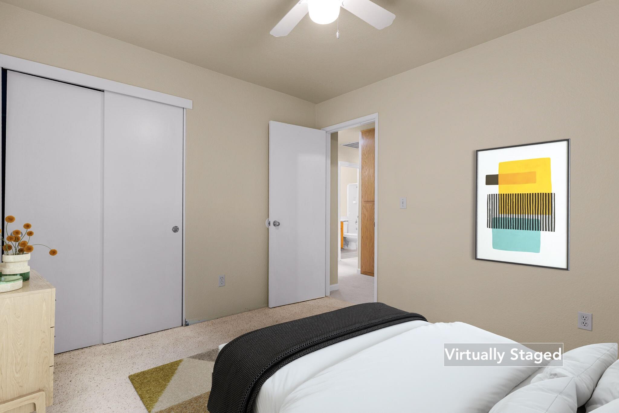 550 Vansicklen Way Redding, CA 96003 - Photo 33 of 52 a bedroom with a bed and a chandelier
