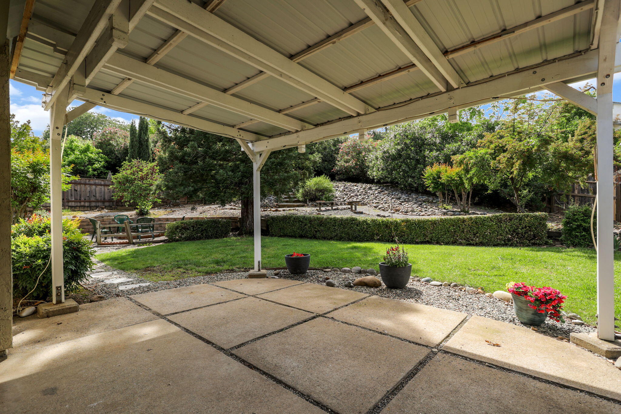 550 Vansicklen Way Redding, CA 96003 - Photo 42 of 52 a view of a chair and table in the garden