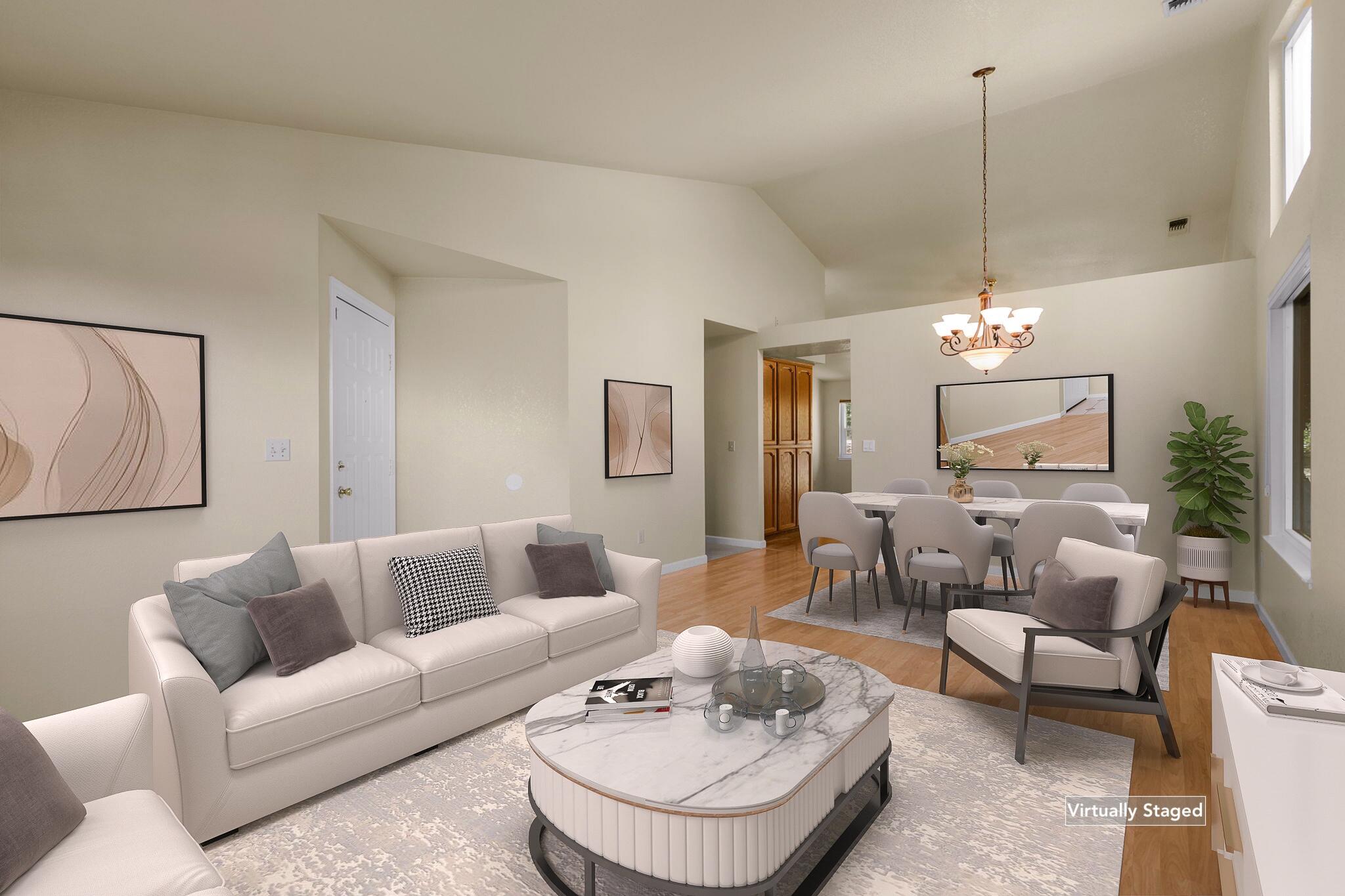 550 Vansicklen Way Redding, CA 96003 - Photo 5 of 52 a living room with furniture and a chandelier