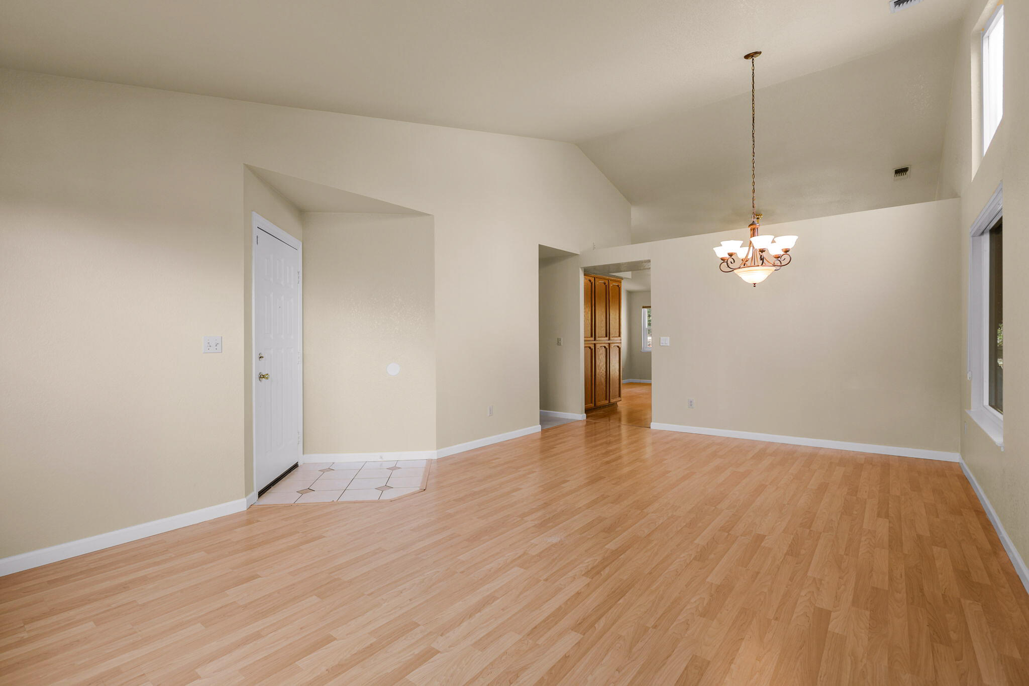 550 Vansicklen Way Redding, CA 96003 - Photo 6 of 52 a view of a room with wooden floor and ceiling fan